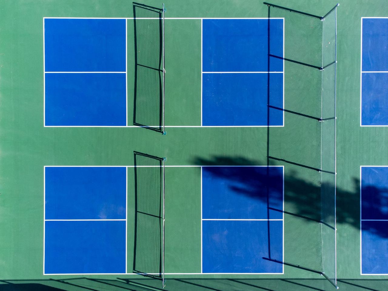 Aerial stock photograph of outdoor pickleball courts, not the Basel club's facilities